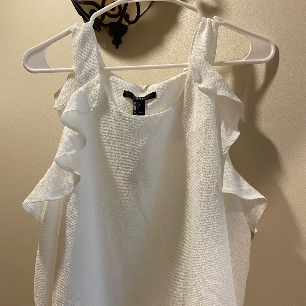 Forever 21 white blouse with cut out shoulders.  New with tags